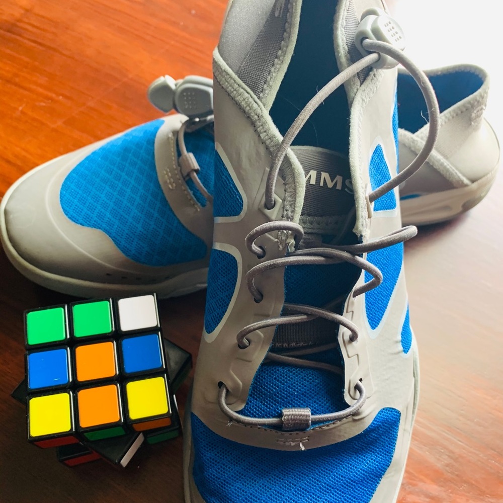 Simms gray and blue fishing shoes like a new brand